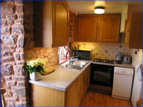 Kitchen area in Allerford Cottage