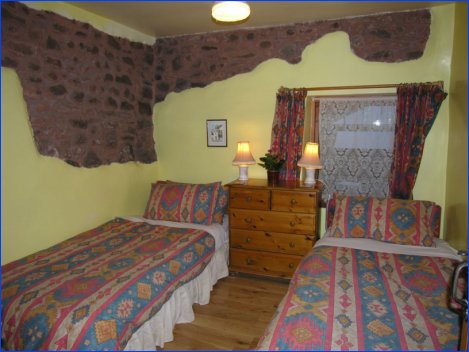 Mid Twin Bedroom in Luccombe Cottage