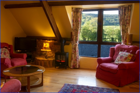 Lounge in Winsford Cottage with view over the Aville Valley